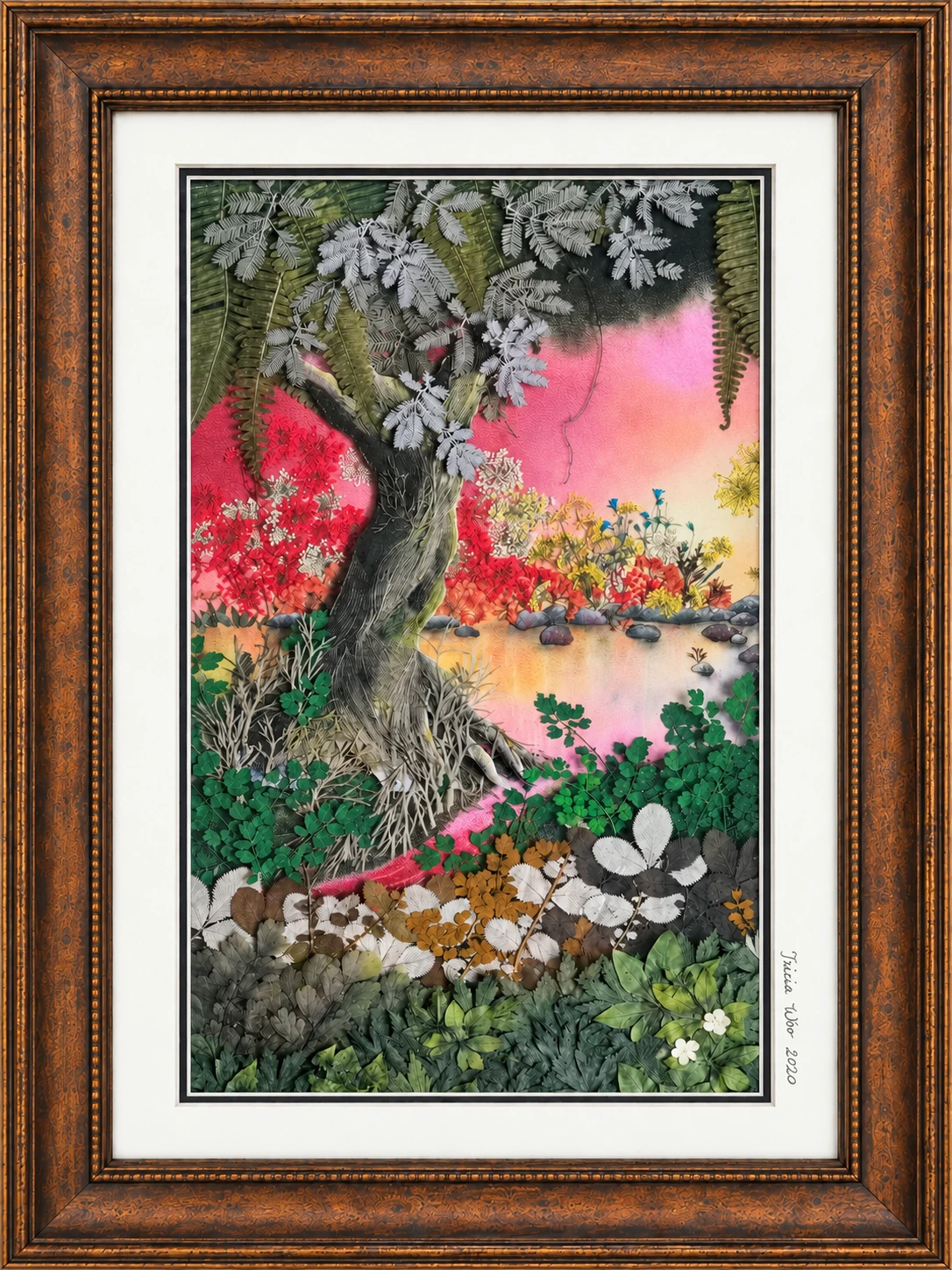 Framed botanical landscape by Tricia Woo, signed 2020, centred on a large tree with preserved botanical foliage and a warm atmospheric background.